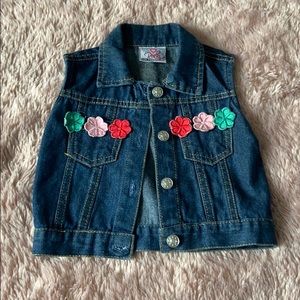 Denim vest with floral patches